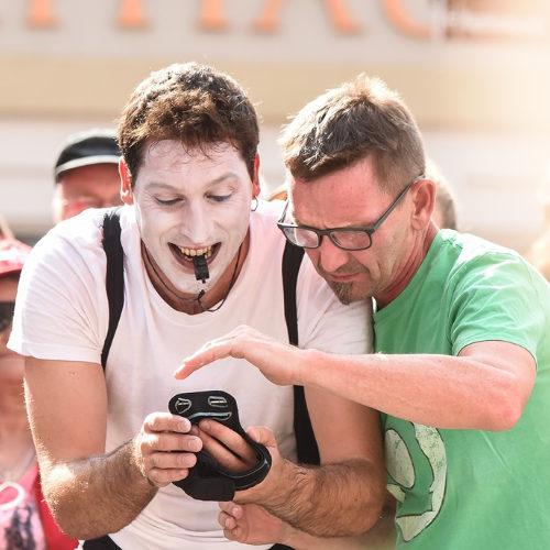 ImproLocura is a street show. Agro the clown next to a spectator, Luca Della Gatta. Luca Della Gatta