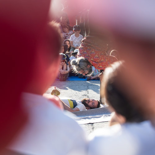 Playground - Chinese Pole Acrobatics Show A comic show that relies on the audience to stay afloat. Miguel Rubio on the pole with as spectator on the floor