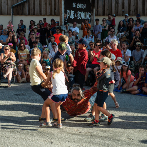 playground, A comic show that relies on the audience to stay afloat. Miguel Rubio surrounded by children lifting him off the ground.